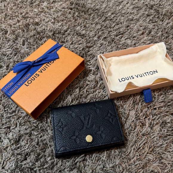 Louis Vuitton Handbags - Louis Vuitton Black Wallet with Gold Accent
